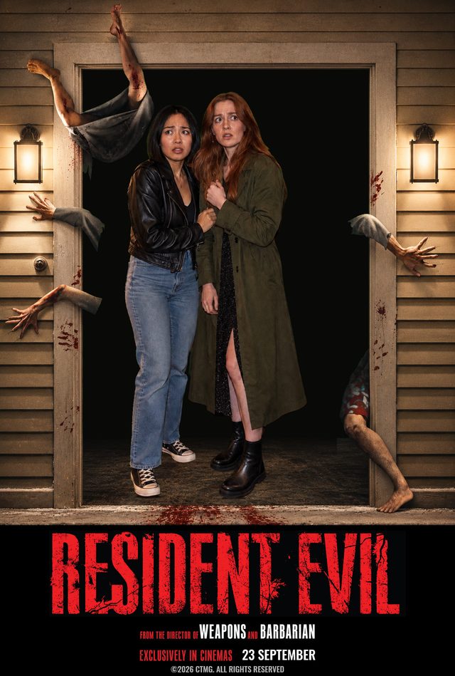 Duo Resident Evil poster: two frightened young women huddle together in the same doorway, with the Resident Evil title beneath them.